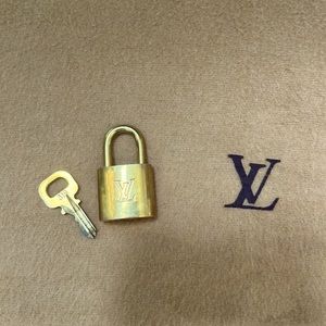 Authentic Louis Vuitton Lock & Key #305 in excellent - Depop